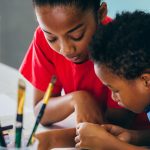 African American kids drawing and painting